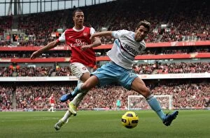 Images Dated 30th October 2010: Marouane Chamakh (Arsenal) Valon Behrami (West Ham). Arsenal 1: 0 West Ham United