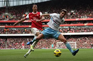 Arsenal V West Ham United 2010-11 Prints: Marouane Chamakh (Arsenal) Valon Behrami (West Ham). Arsenal 1: 0 West Ham United