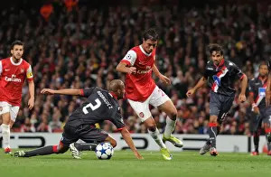 Arsenal V SC Braga 2010-11 Prints: Marouane Chamakh breaks past Braga defender Alberto Rodriguez to score the 3rd Arsenal goal