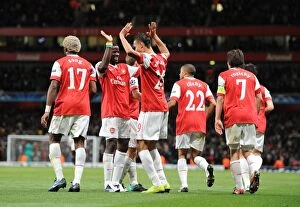 Arsenal v Shaktar Donetsk 2010 - 11 Collection: Marouane Chamakh celebrates scoring the 5th Arsenal goal with Emmanuel Eboue