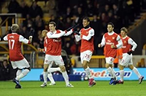 Wolverhampton Wanderers v Arsenal 2010-11 Collection: Marouane Chamakh celebrates scoring his and Arsenals 1st goal with Sebastien Squillaci