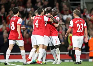 Arsenal V SC Braga 2010-11 Prints: Marouane Chamakh celebrates scoring Arsenals 3rd goal with Bacary Sagna