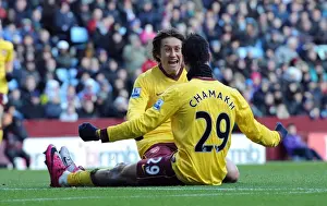Marouane Chamakh celebrates scoring Arsenals 3rd goal with Tomas Rosicky
