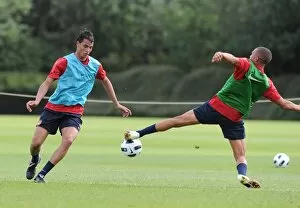 Images Dated 6th July 2010: Marouane Chamakh and Kieran Gibbs (Arsenal). Arsenal Training Ground, London Colney