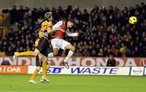 Images Dated 10th November 2010: Marouane Chamakh scores Arsenals 1st goal under pressure from Richard Stearma