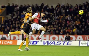 Wolverhampton Wanderers V Arsenal 2010-11 Prints: Marouane Chamakh scores Arsenals 1st goal under pressure from Richard Stearma