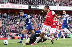 Images Dated 16th October 2010: Marouane Chamakh scores Arsenals 2nd goal past Ben Foster and Scott Dann