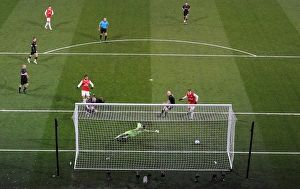 Marouane Chamakh shoots past Orient goalkeeper Jamie Jones to score the 1st Arsenal goal Marouane Chamakh shoots past Orient goalkeeper Jamie Jones to score the 1st Arsenal goal