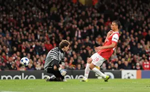 Marouane Chamakh shoots past Shakhtar goalkeeper Andriy Pyatov to score the 5th Arsenal goal