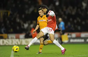 Wolverhampton Wanderers V Arsenal 2010-11 Prints: Marouane Chamakh shoots past Wolves goalkeeper Marcus Hahnemann to score the 2nd Arsenal goal