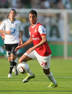 Legia Warsaw V Arsenal 2010-11 Prints: Marouane Chamakh's Unforgettable Comeback: Arsenal's Thrilling 5-6 Victory Over Legia Warsaw