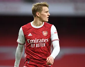 Martin Odegaard in Action: Arsenal vs. Tottenham Hotspur at Emirates Stadium - Premier League 2021 (Empty Stadium)
