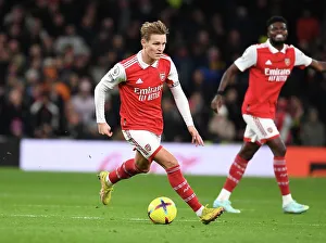 Martin Odegaard in Action: Arsenal vs. Tottenham Premier League Clash, 2022-23