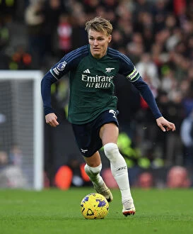Images Dated 31st December 2023: Martin Odegaard in Action: Arsenal vs. Fulham, Premier League 2023-24