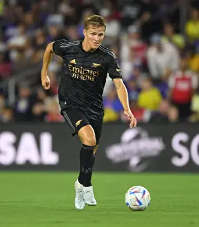 Orlando City SC V Arsenal 2022-23 Prints: Martin Odegaard in Action: Arsenal vs Orlando City SC Pre-Season Clash at Exploria Stadium