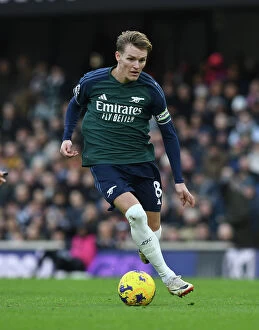 Images Dated 31st December 2023: Martin Odegaard in Action: Premier League 2023-24 - Arsenal vs. Fulham