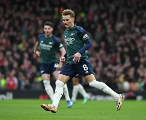 Martin Odegaard in Action: Premier League Showdown between Fulham and Arsenal, 2023-24