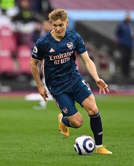 Images Dated 21st March 2021: Martin Odegaard in Action: West Ham United vs. Arsenal, Premier League 2020-21