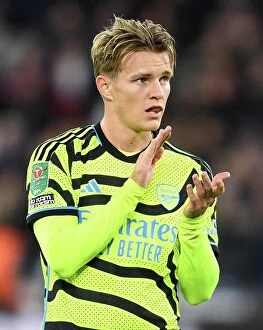 West Ham United v Arsenal - Carabao Cup 2023-24 Collection: Martin Odegaard Applauds Arsenal Fans: West Ham vs Arsenal, Carabao Cup 2023-24