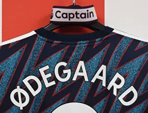 Southampton V Arsenal 2021-22 Prints: Martin Odegaard: Arsenal Captain Gears Up for Southampton Showdown in the Changing Room