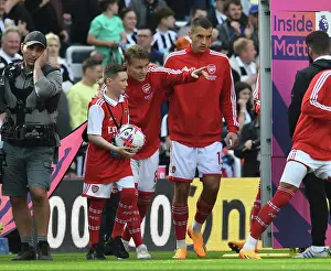 Martin Odegaard and Arsenal Mascot Before Newcastle United vs Arsenal FC, Premier League 2022-23