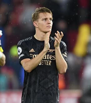 Images Dated 23rd October 2022: Martin Odegaard Celebrates with Arsenal Fans after Southampton Victory, 2022-23 Premier League