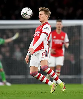 Martin Odegaard Faces Liverpool in Carabao Cup Showdown: Arsenal's Midfield Maestro Battles Rivals in Semi-Final Clash
