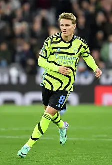 Martin Odegaard Focuses Intently: West Ham United vs Arsenal, Carabao Cup 2023-24