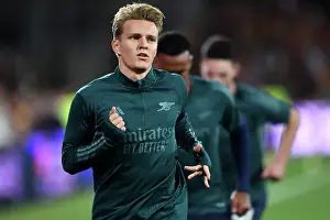 RC Lens V Arsenal 2023-24 Prints: Martin Odegaard Gears Up: Arsenal's Star Prepares for RC Lens Showdown in UEFA Champions League
