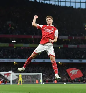 Martin Odegaard Scores the Opener: Arsenal Leads Chelsea in Thrilling 2022-23 Premier League Clash