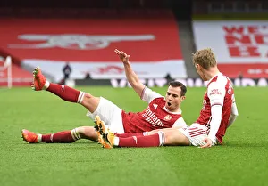 Martin Odegaard Scores the Opener: Arsenal vs. Tottenham Hotspur in Emirates Stadium (2020-21)