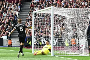 Martin Odegaard Scores Thrilling Second Goal: Arsenal's Victory at London Stadium vs. West Ham United (April 2023)