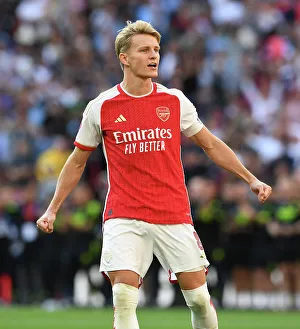 Martin Odegaard Scores the Winning Penalty: Arsenal Claims FA Community Shield over Manchester City