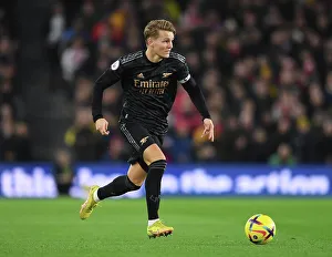 Martin Odegaard Shines: Arsenal's Midfield Genius Guides Team to Premier League Triumph over Brighton (2022-23)