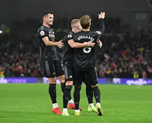 Martin Odegaard and Teammates Celebrate Goal Against Brighton & Hove Albion in 2022-23 Premier League