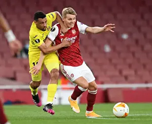 Arsenal V Villarreal 2020-21 Prints: Martin Odegaard vs. Francis Coquelin: A Riveting Rivalry in Empty Emirates Stadium - Arsenal vs