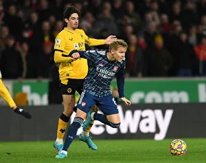 Martin Odegaard vs Francisco Trincao: Intense Battle in Wolverhampton Wanderers vs Arsenal Premier League Clash
