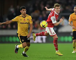 Wolverhampton Wanderers V Arsenal 2022-23 Prints: Martin Odegaard vs. Matheus Nunes: Heading Battle at Molineux - Wolverhampton Wanderers vs