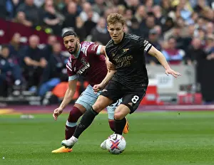 Martin Odegaard vs Said Benrahma: Intense Battle in West Ham United vs Arsenal FC Premier League Clash, London 2023