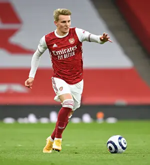 Martin Odegaard vs. Tottenham: A Battle at Empty Emirates in the Premier League 2020-21
