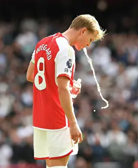 Arsenal V Tottenham Hotspur 2023-24 Prints: Martin Odegaard vs. Tottenham: The Thrilling 2023-24 Premier League Clash at Emirates Stadium