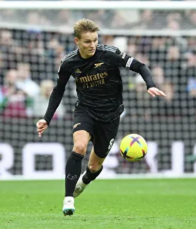 Martin Odegaard's Brilliant Midfield Display: Arsenal Secures Victory Over Aston Villa in the 2022-23 Premier League