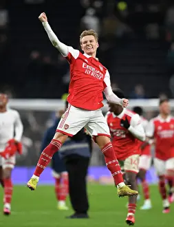 Martin Odegaard's Celebration: Arsenal's Victory Over Tottenham Hotspur in the Premier League (2022-23)