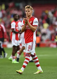 Martin Odegaard's Euphoric Celebration with Arsenal Fans: Triumph over Norwich City