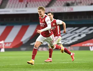 Martin Odegaard's Goal: Arsenal's Victory Over Tottenham Amidst Empty Emirates Stadium (2020-21)