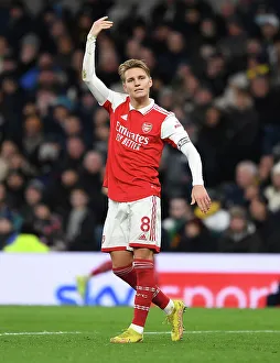 Tottenham Hotspur V Arsenal 2022-23 Prints: Martin Odegaard's Intense Battle: Arsenal vs. Tottenham, Premier League 2022-23