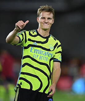 Images Dated 28th September 2023: Martin Odegaard's Reaction: Brentford vs Arsenal in Carabao Cup 2023-24