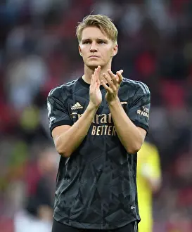 Martin Odegaard's Triumphant Celebration: Arsenal Fans Go Wild After Manchester United Defeat, Premier League 2022-23