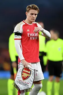 Martin Odegaard's Unwavering Determination: Arsenal's Champion's League Battle against RC Lens (2023/24)