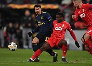 Images Dated 13th December 2019: Martinelli Faces Pressure: Arsenal vs. Standard Liege, UEFA Europa League (December 2019)